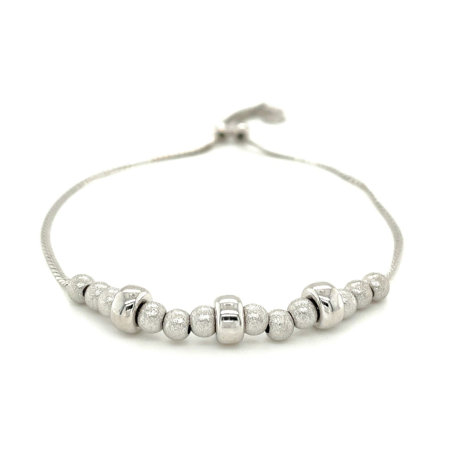 Adjustable Matte And Textured Bead Bracelet In Sterling Silver