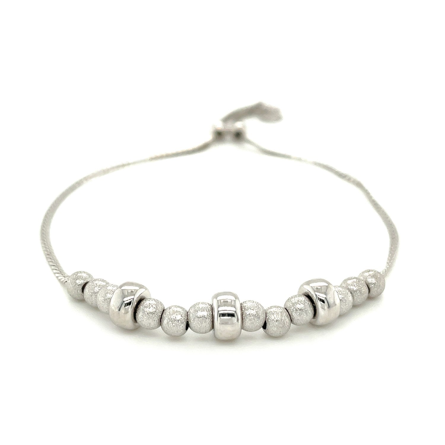 Adjustable Matte And Textured Bead Bracelet In Sterling Silver