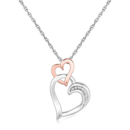 Sterling Silver Cascading Dual Heart Diamond Accented Pendant (.02 Cttw)